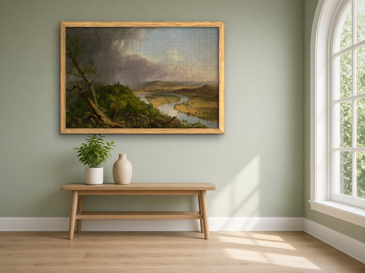 After the Storm Passed 1014 piece puzzle assembled, framed in light wood on a sage green wall above a wooden bench, next to a tall arched window