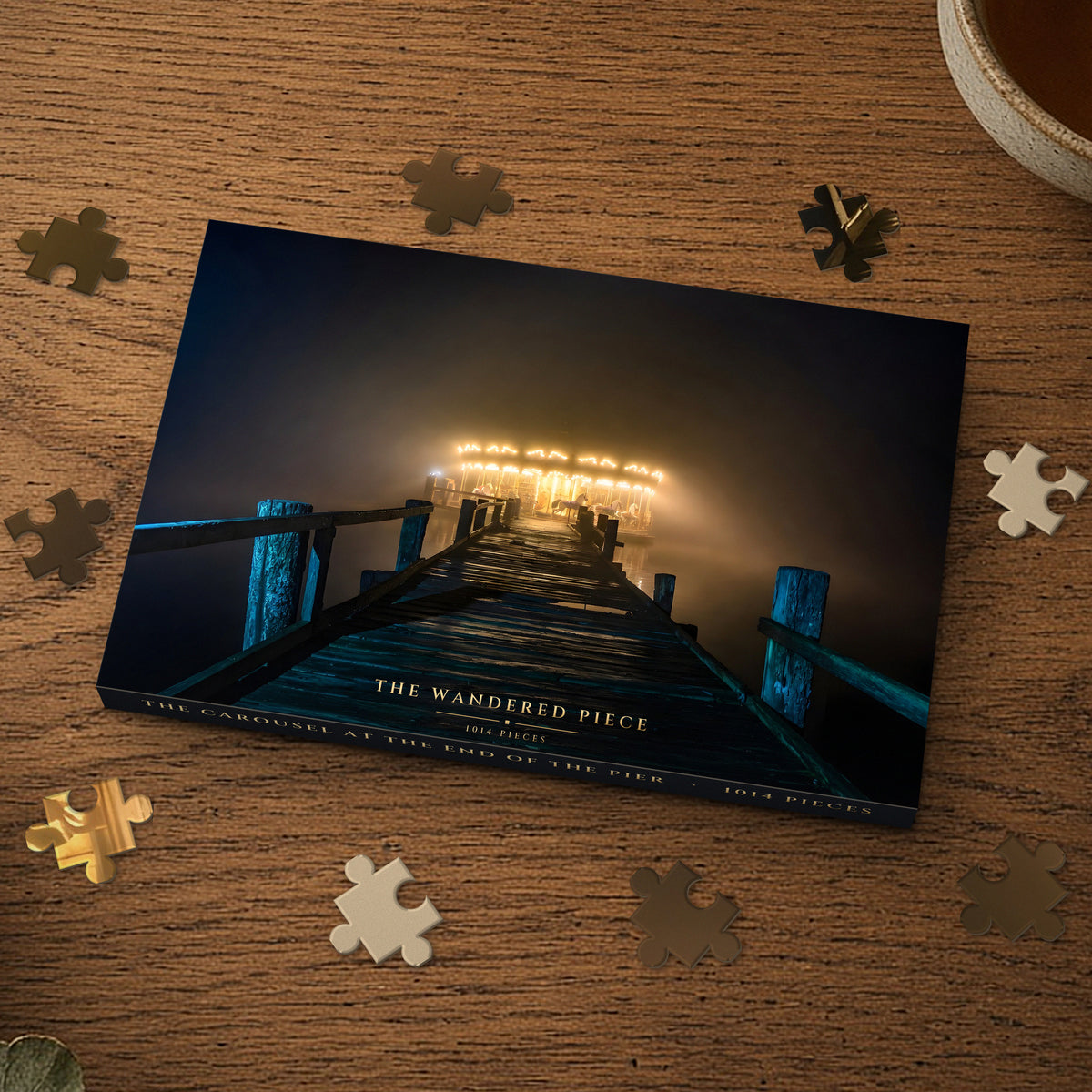The Carousel at the End of the Pier 1014 piece puzzle box on a wood table with loose pieces, box design shown for illustration