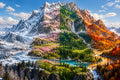 The Mountain That Keeps All Four Seasons art puzzle: a single mountain split into four seasons, snowy winter slopes, pink spring blossoms, green summer forest and red and orange autumn trees, a turquoise river and waterfall at its base