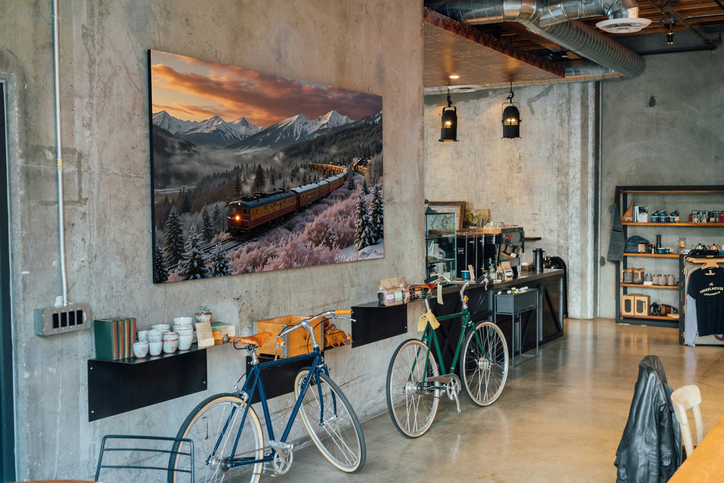 The Mountain Train in Winter 1014 piece puzzle shown framed on a wall after completion