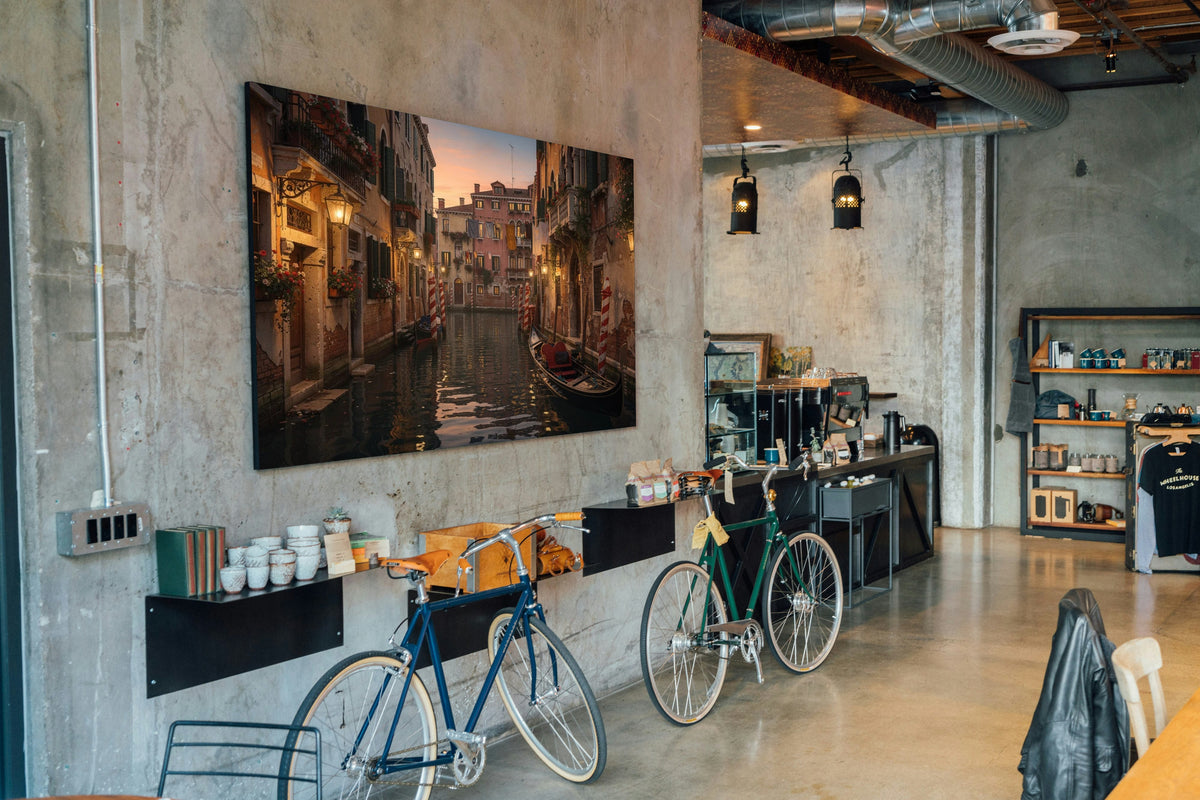 The Venice Canal at Evening 1014 piece puzzle shown framed on a wall after completion